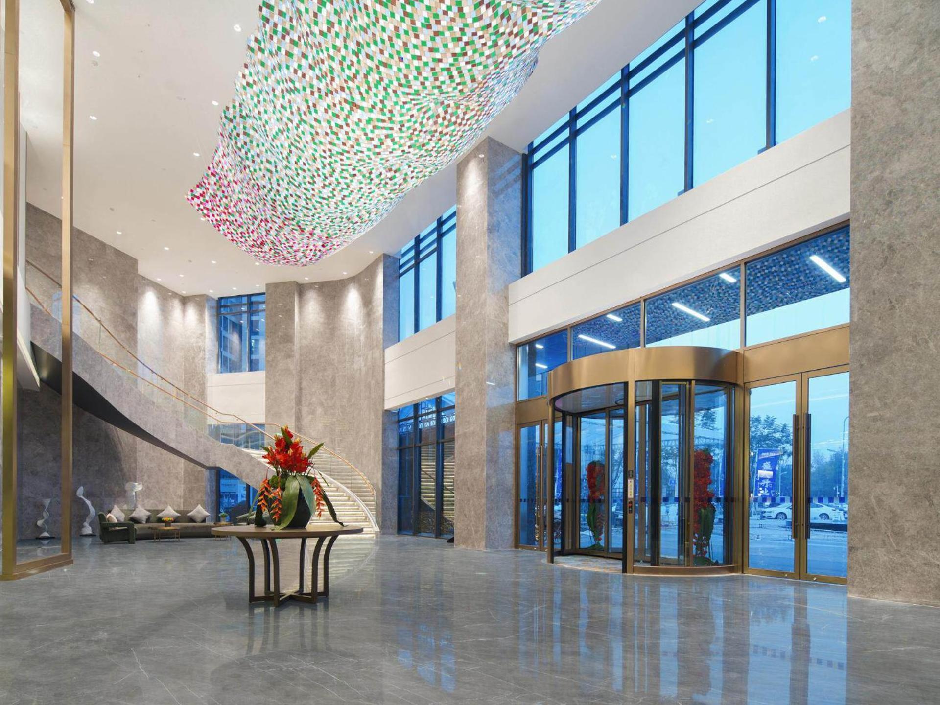 Park Inn By Radisson Nanchong Yilong Star City Plaza Екстер'єр фото