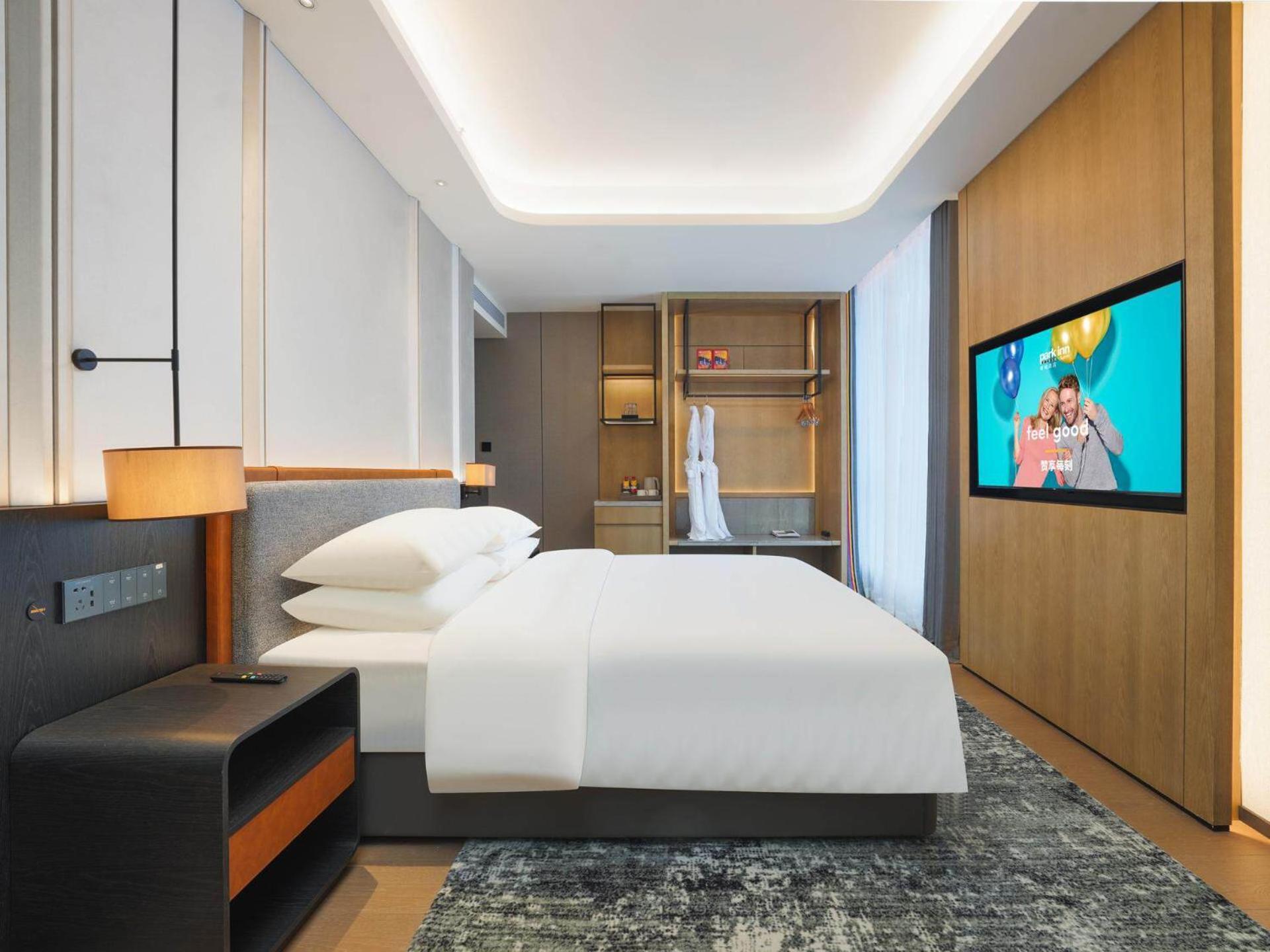 Park Inn By Radisson Nanchong Yilong Star City Plaza Екстер'єр фото