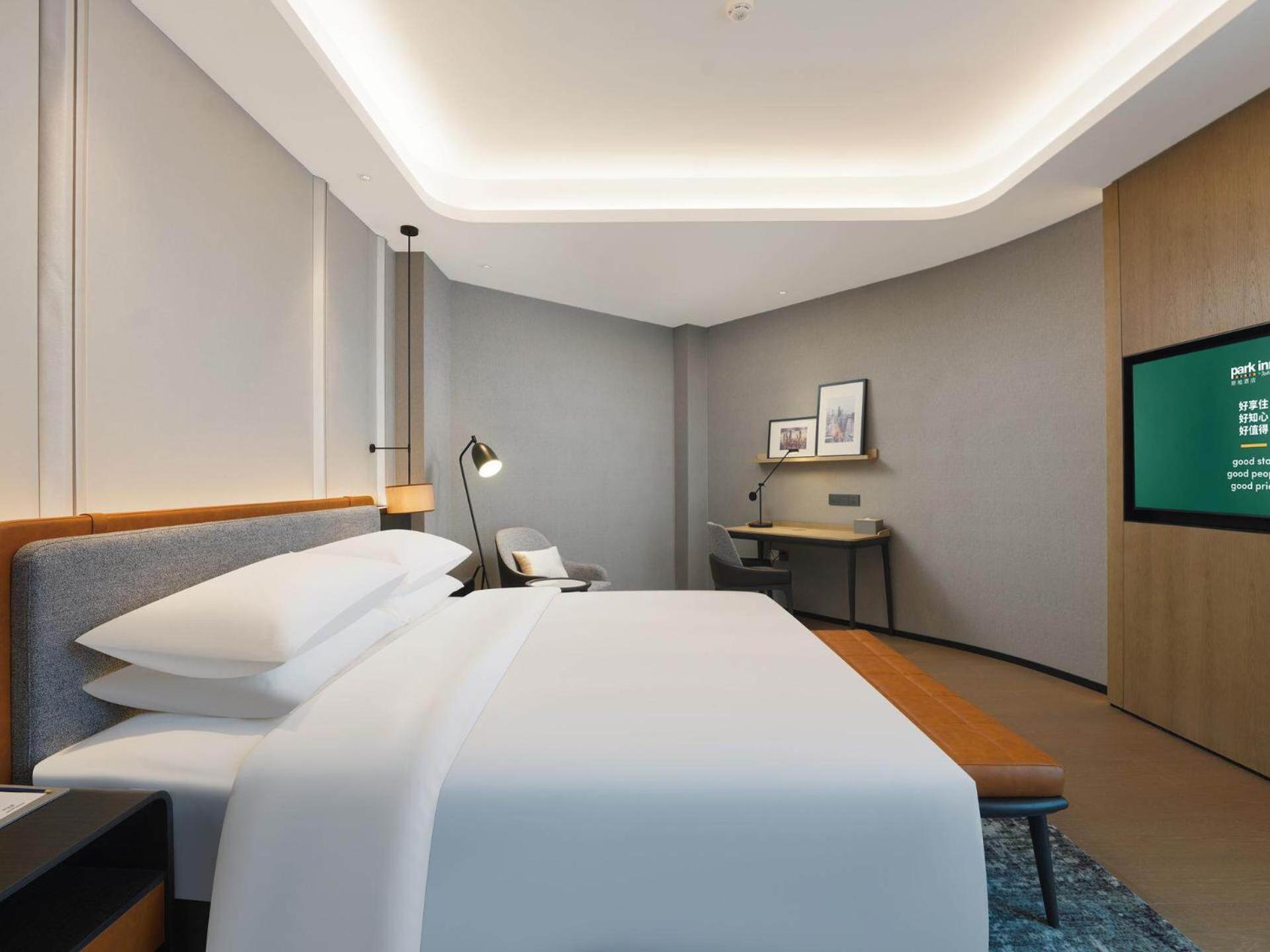 Park Inn By Radisson Nanchong Yilong Star City Plaza Екстер'єр фото