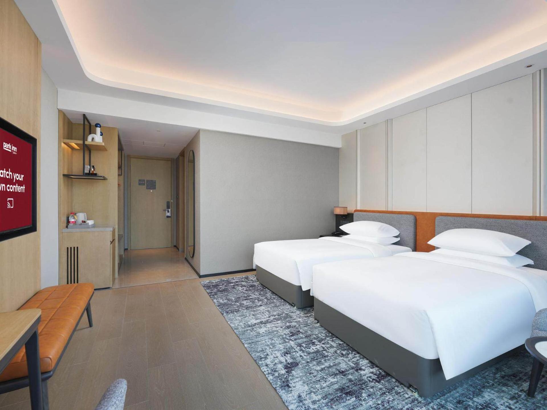 Park Inn By Radisson Nanchong Yilong Star City Plaza Екстер'єр фото