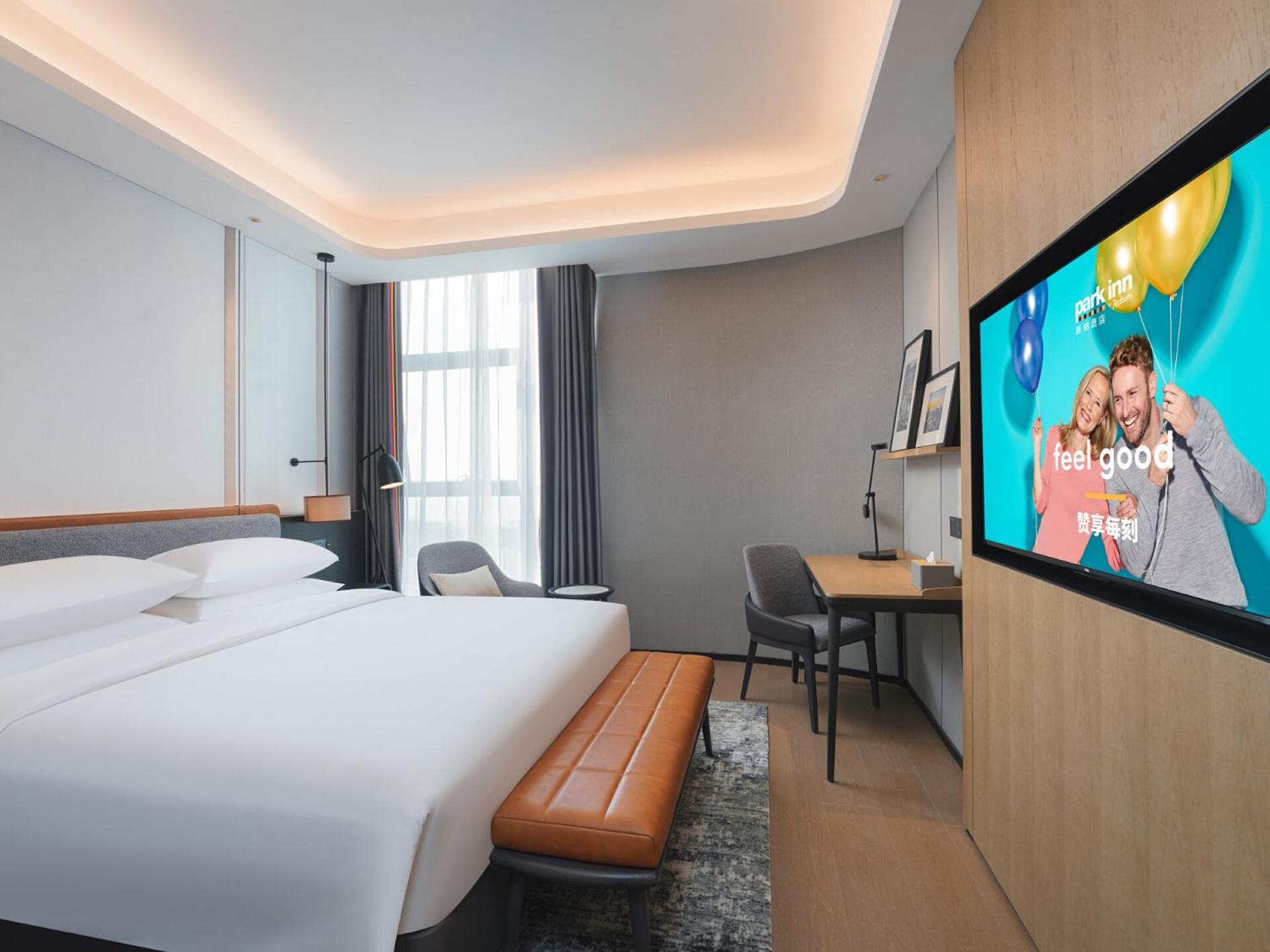 Park Inn By Radisson Nanchong Yilong Star City Plaza Екстер'єр фото