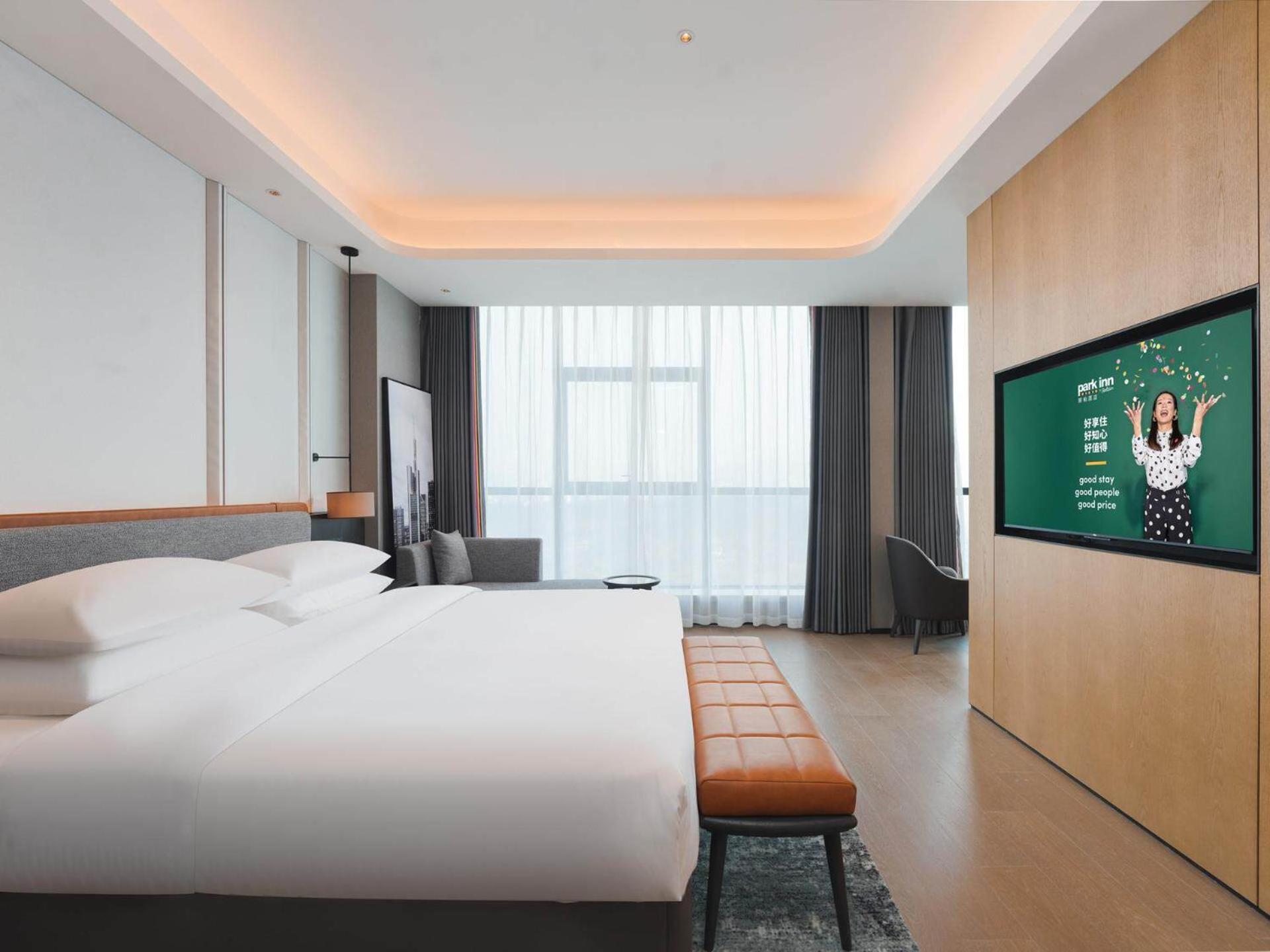 Park Inn By Radisson Nanchong Yilong Star City Plaza Екстер'єр фото
