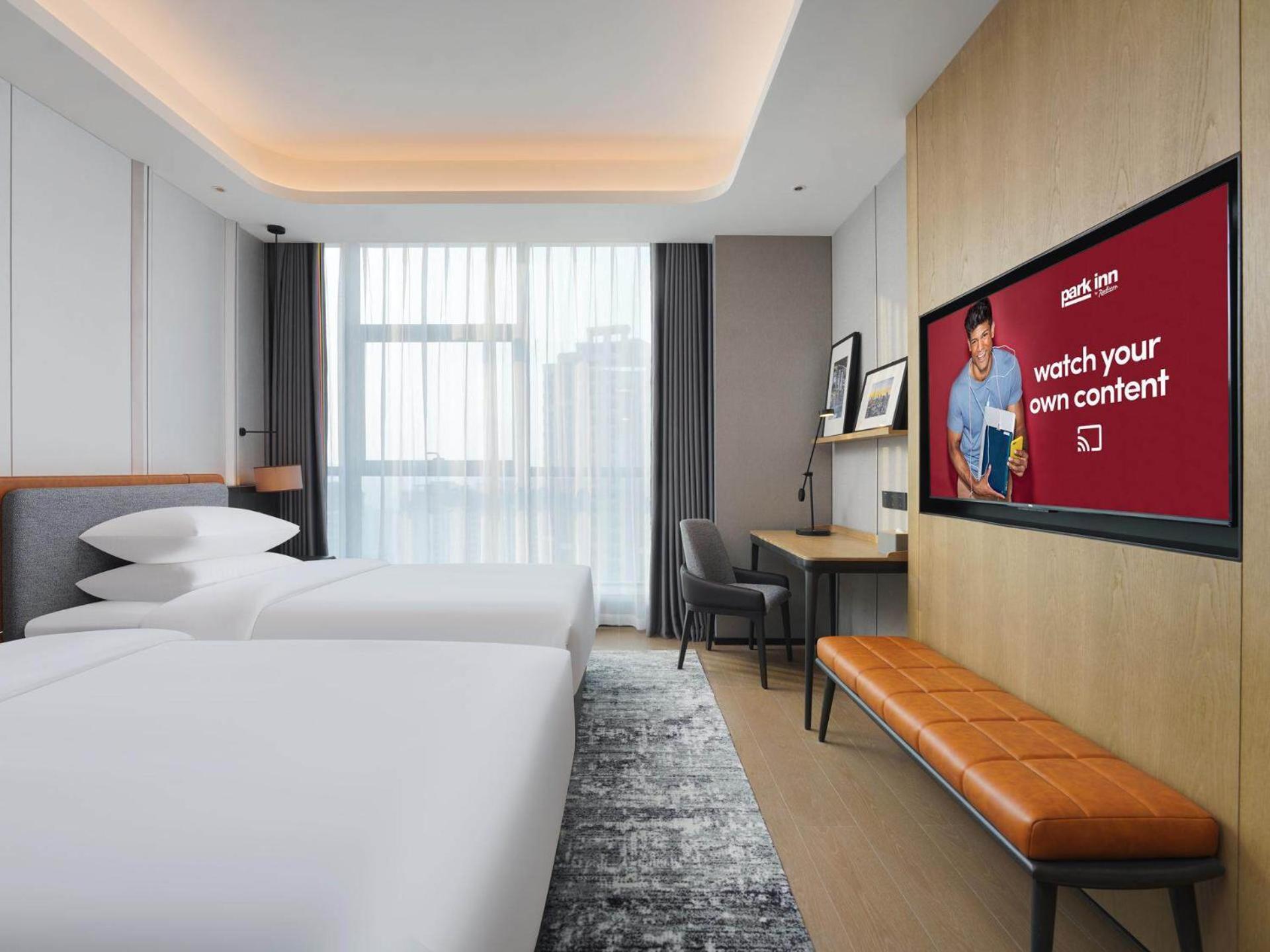 Park Inn By Radisson Nanchong Yilong Star City Plaza Екстер'єр фото