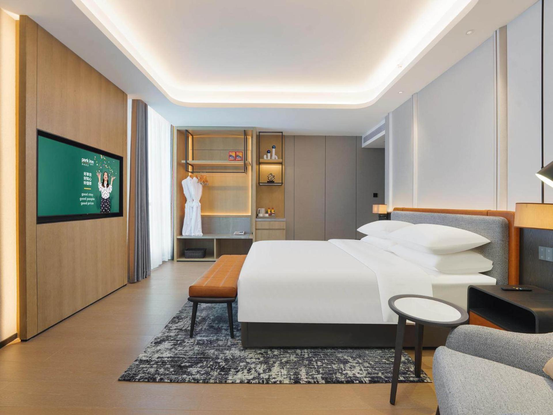 Park Inn By Radisson Nanchong Yilong Star City Plaza Екстер'єр фото