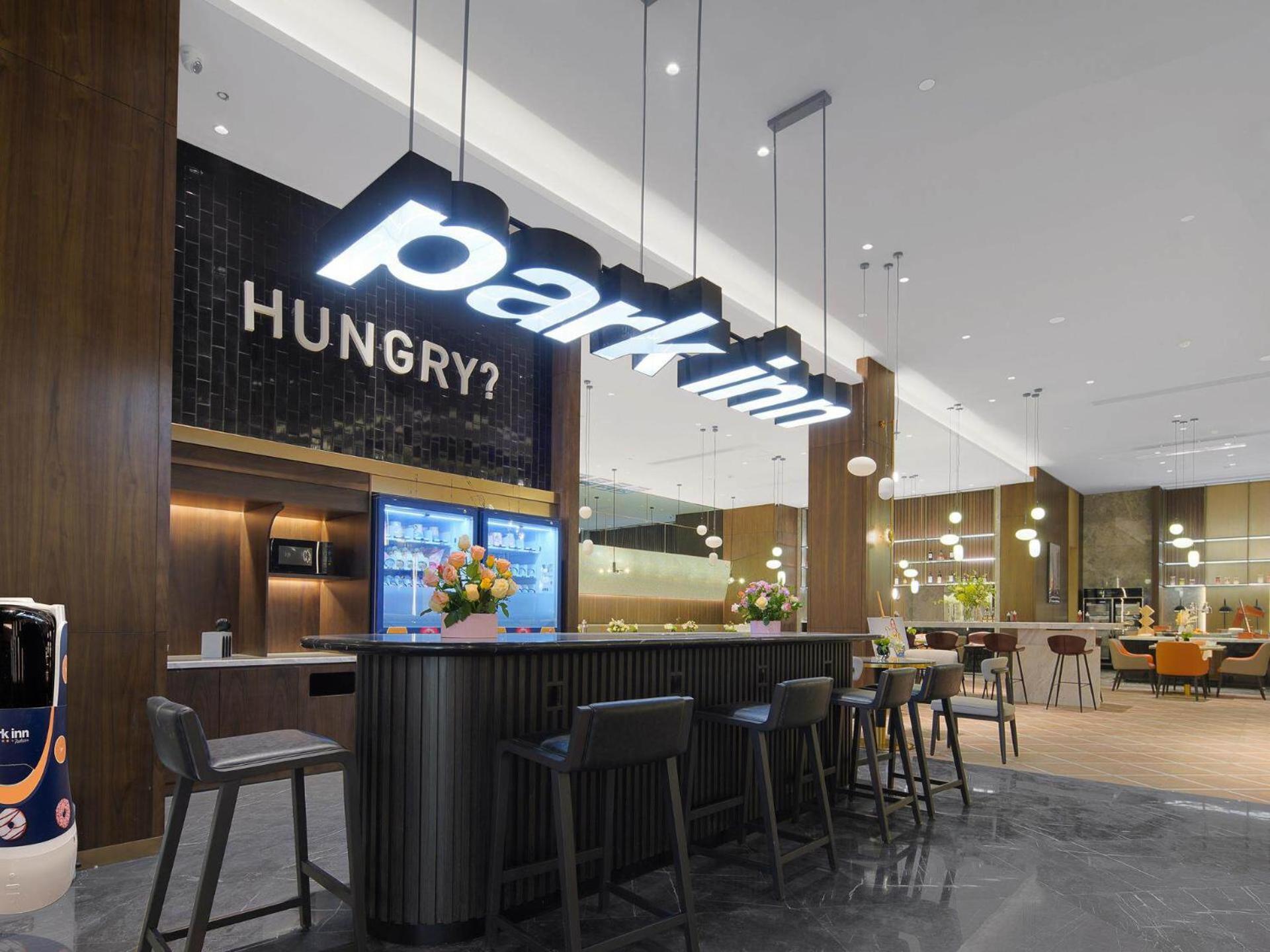 Park Inn By Radisson Nanchong Yilong Star City Plaza Екстер'єр фото